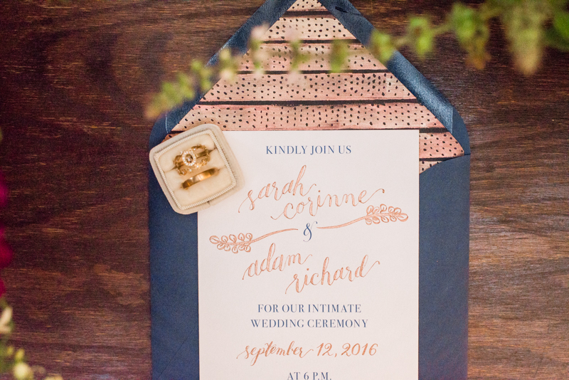 Wedding invitations and rings at La Cuchara Baltimore styled shoot