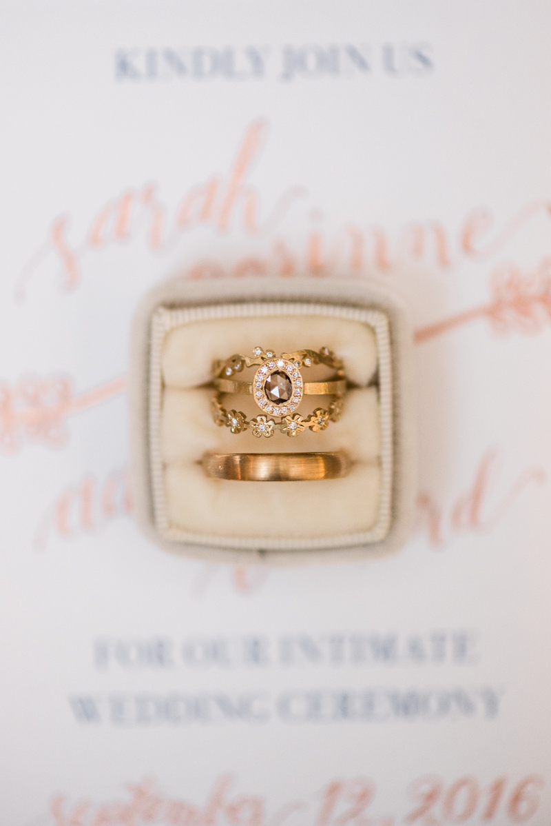 Wedding invitations and rings at La Cuchara Baltimore styled shoot