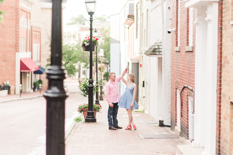 Wedding Photographers in Maryland Downtown Annapolis Engagement Session Sunrise Pastel Main Street Dancing