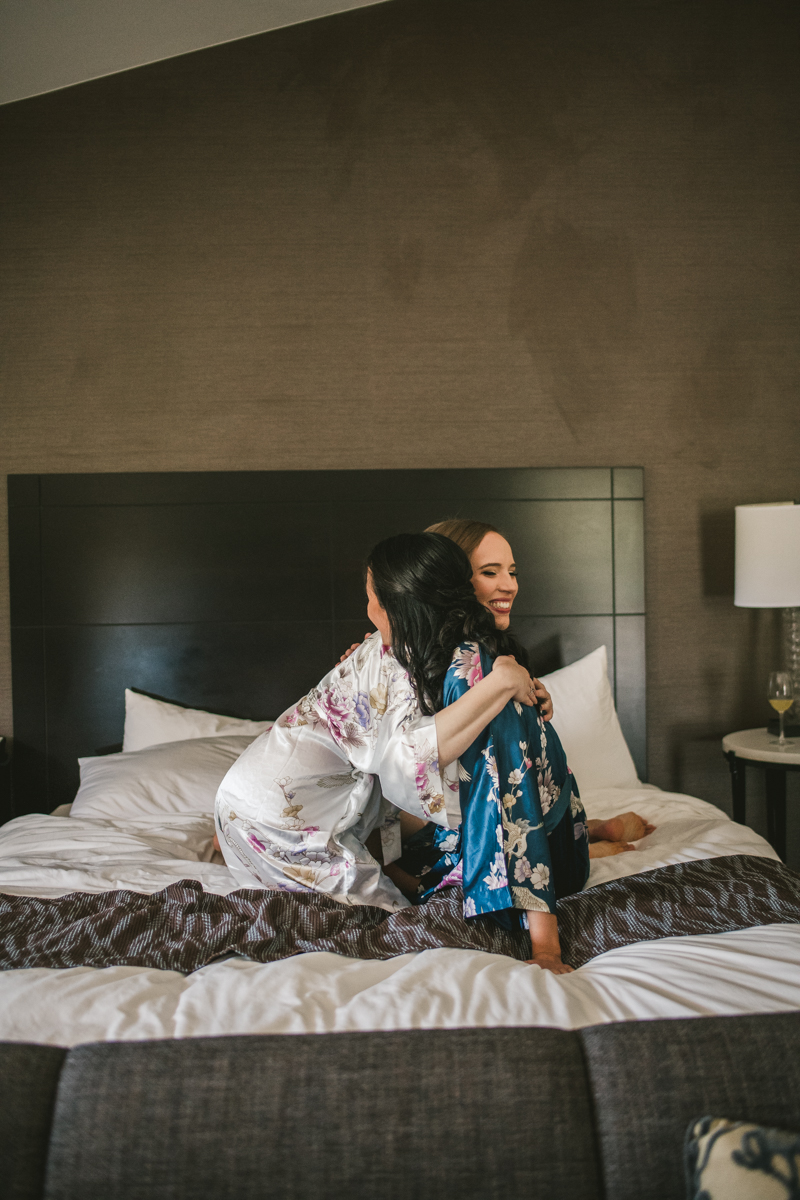 Industrial chic April wedding bridal party in Baltimore City's Radisson Hotel by Britney Clause Photography