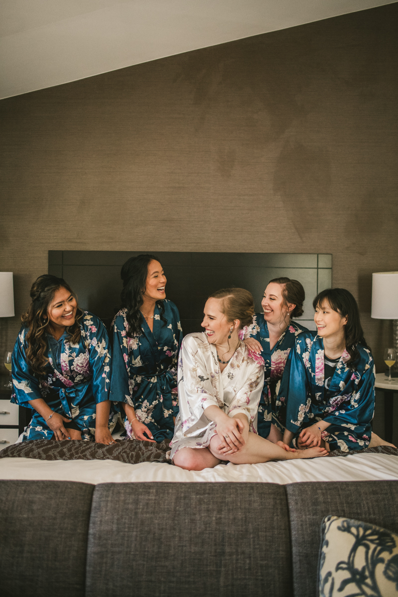 Industrial chic April wedding bridal party in Baltimore City's Radisson Hotel by Britney Clause Photography