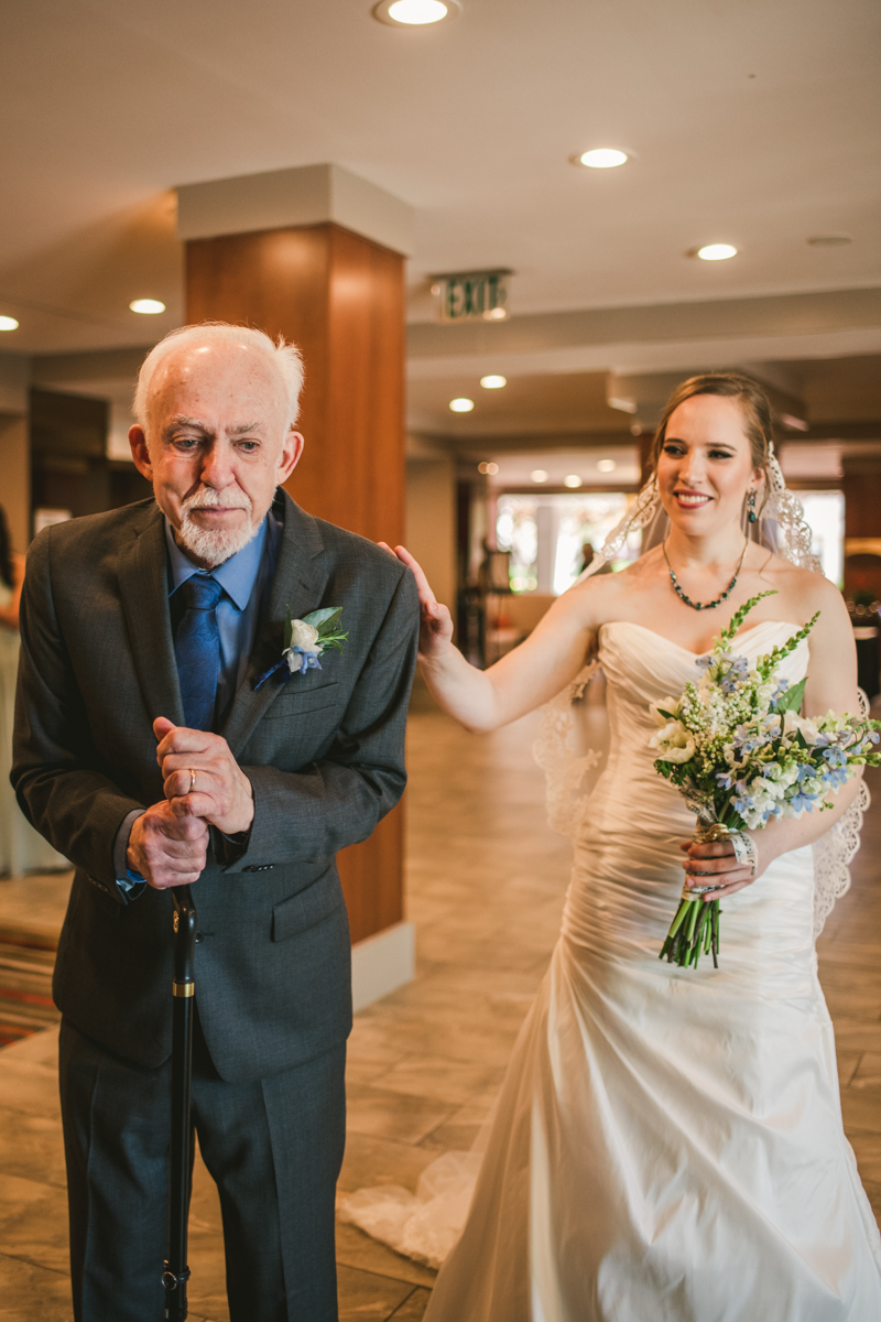 Industrial chic April wedding Father Daughter first look in Baltimore City's Radisson Hotel by Britney Clause Photography