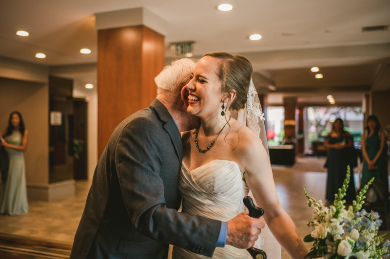 Industrial chic April wedding Father Daughter first look in Baltimore City's Radisson Hotel by Britney Clause Photography