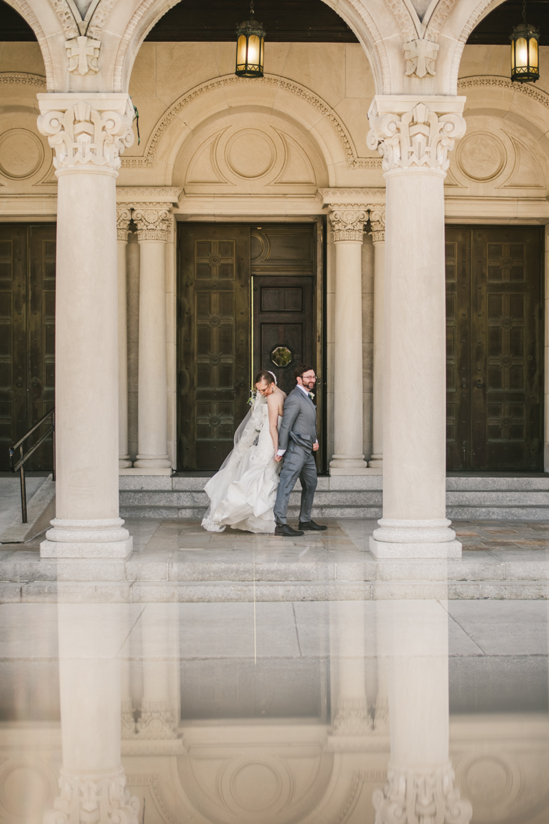 Industrial chic April wedding bride and groom's first look in Baltimore City's St. Joseph's Monastery Parish by Britney Clause Photography