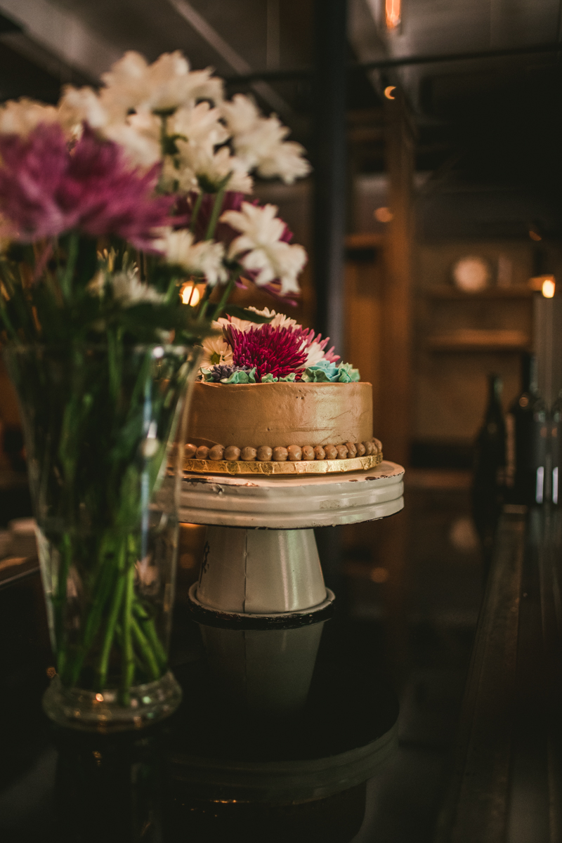 Industrial chic April wedding reception in Baltimore City at La Cuchara cake by Britney Clause Photography