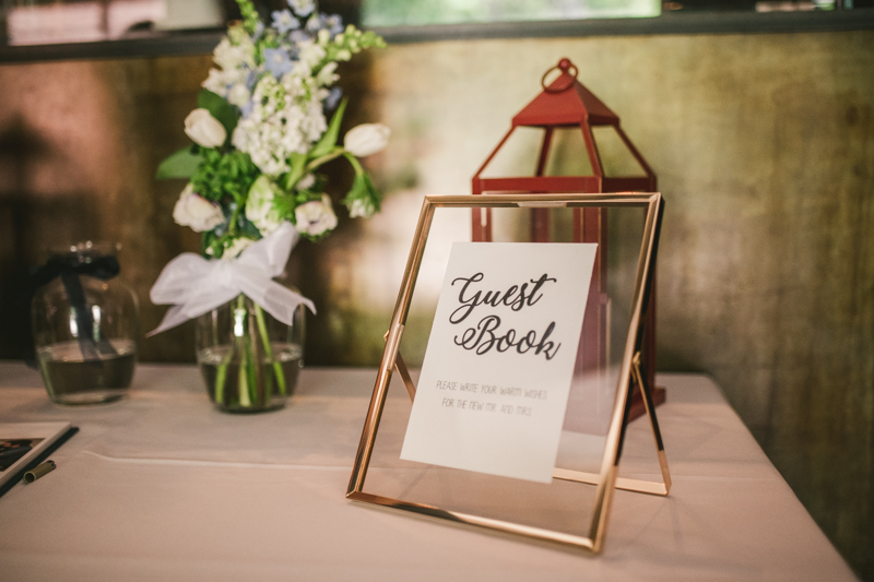 Industrial chic April wedding reception guest book table in Baltimore City at La Cuchara by Britney Clause Photography