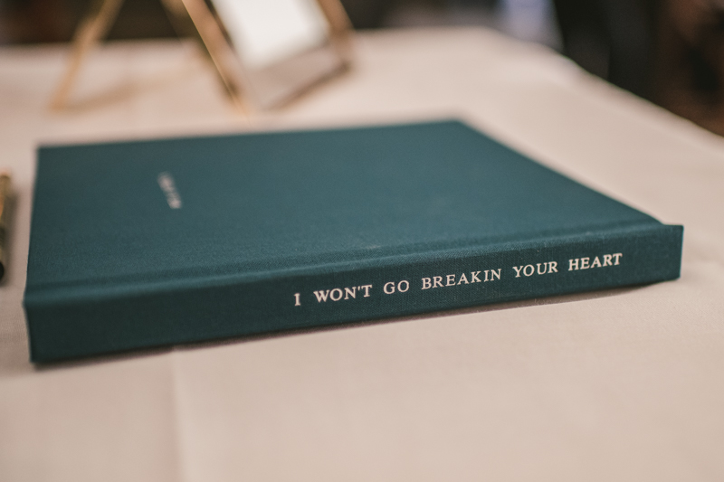 Industrial chic April wedding reception guest book table in Baltimore City at La Cuchara by Britney Clause Photography