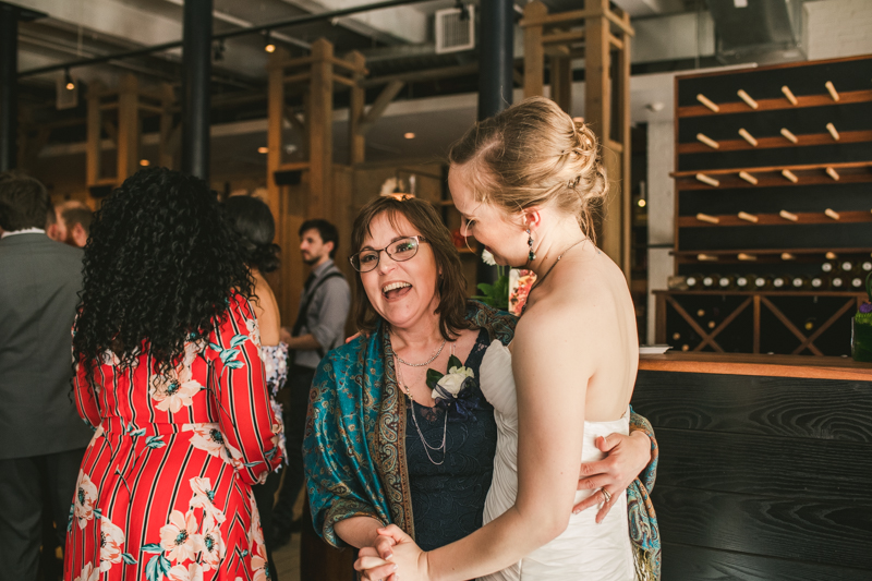 Industrial chic April wedding reception in Baltimore City at La Cuchara by Britney Clause Photography