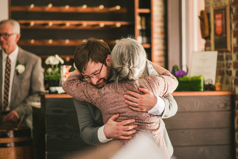 Industrial chic April wedding reception in Baltimore City at La Cuchara by Britney Clause Photography