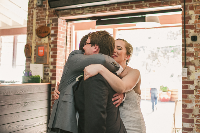 Industrial chic April wedding reception in Baltimore City at La Cuchara by Britney Clause Photography