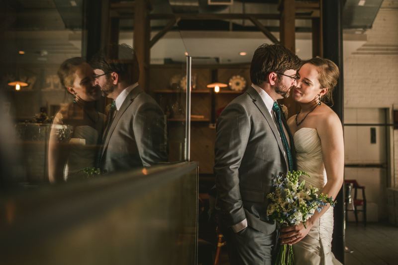 Industrial chic April wedding bride and groom portraits in Baltimore City at La Cuchara by Britney Clause Photography