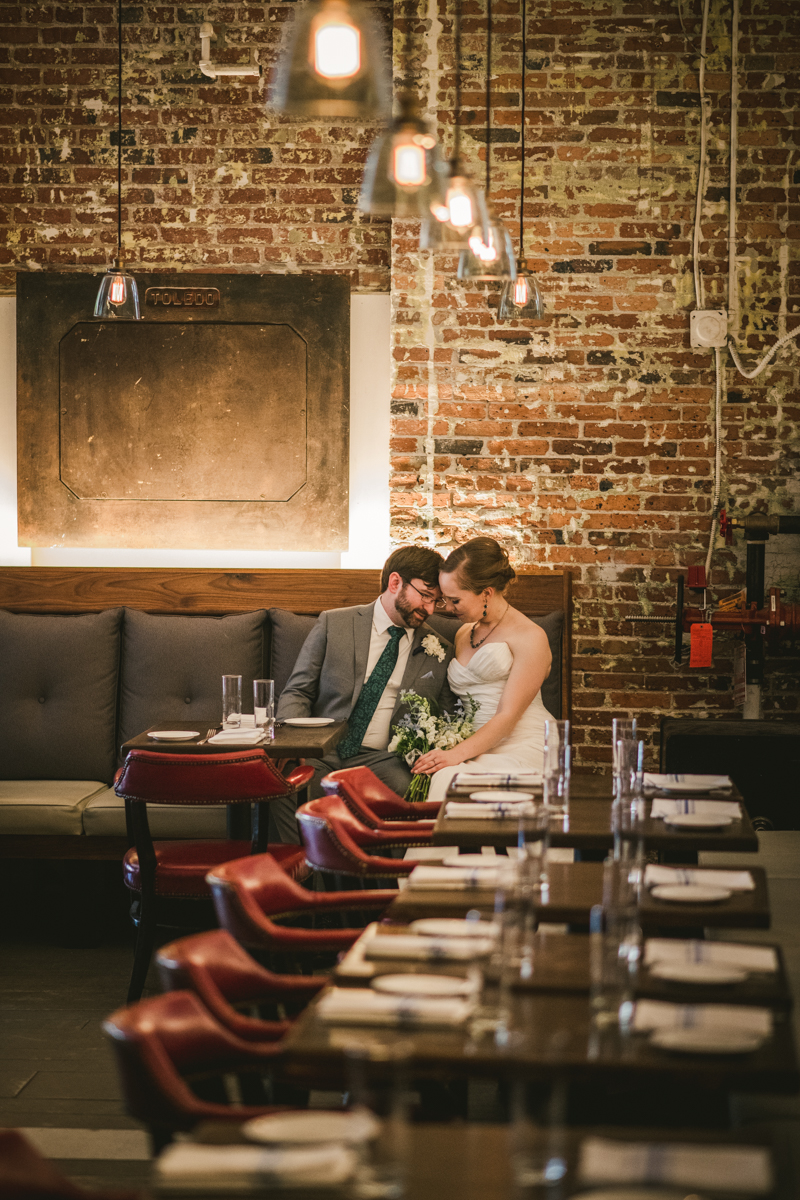 Industrial chic April wedding bride and groom portraits in Baltimore City at La Cuchara by Britney Clause Photography