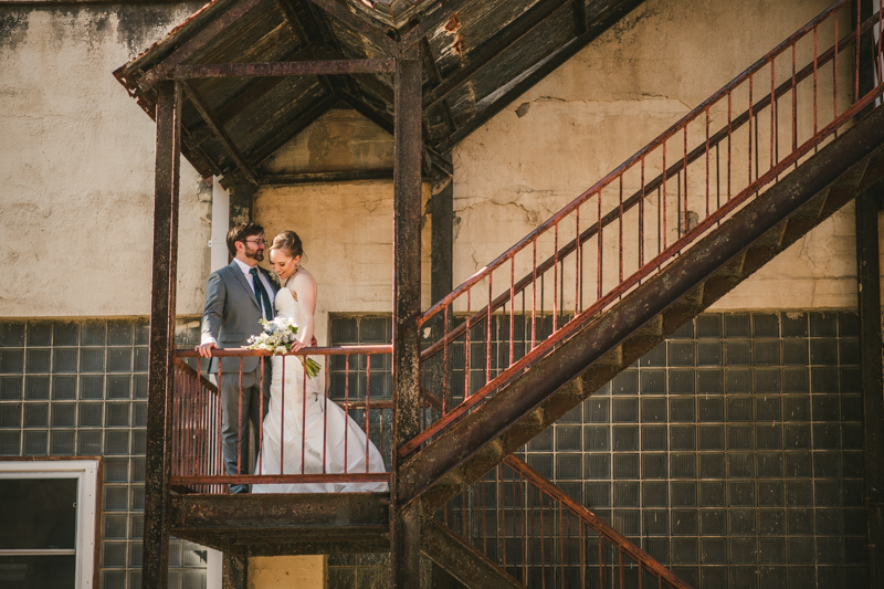 Industrial chic April wedding bride and groom portraits in Baltimore City at Clipper Mill by Britney Clause Photography