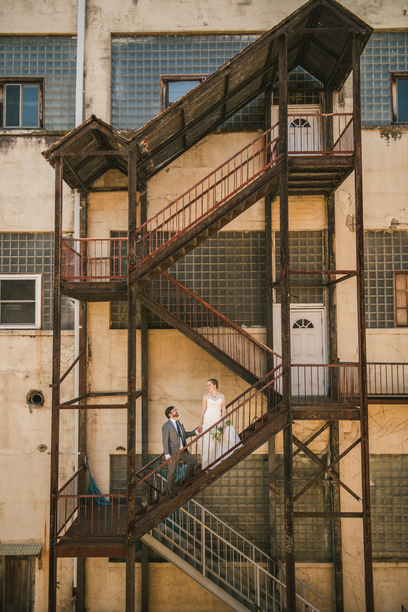 Industrial chic April wedding bride and groom portraits in Baltimore City at Clipper Mill by Britney Clause Photography