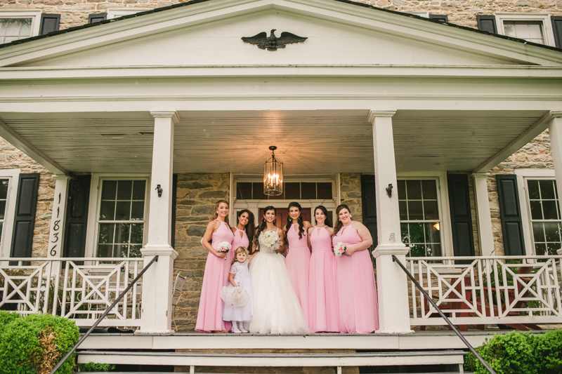 A beautiful stormy April wedding at Springfield Manor in Thurmont Maryland pink bridesmaids dresses from Azazie