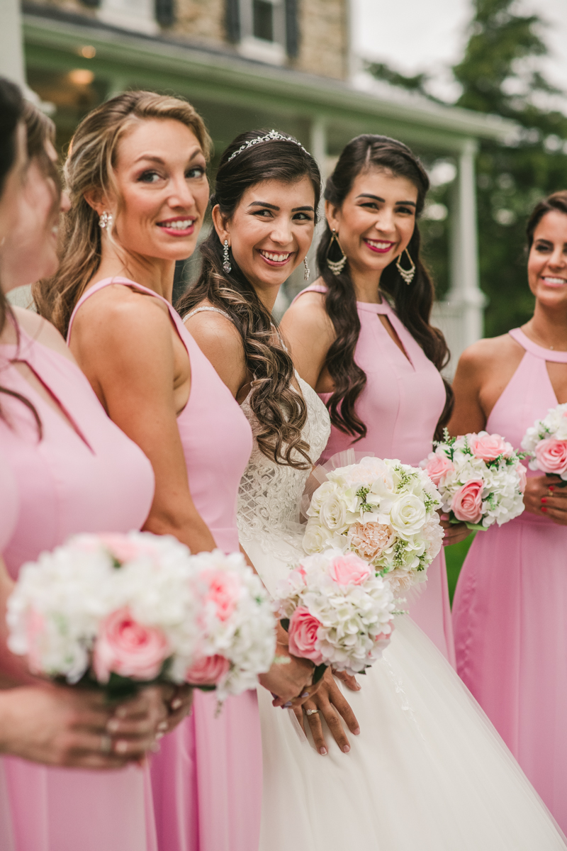 A beautiful stormy April wedding at Springfield Manor in Thurmont Maryland pink bridesmaids dresses from Azazie