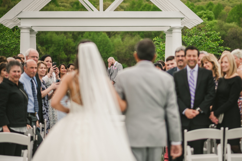 A beautiful stormy April wedding ceremony at Springfield Manor in Thurmont Maryland