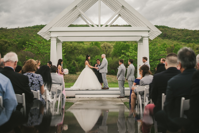 A beautiful stormy April wedding ceremony at Springfield Manor in Thurmont Maryland