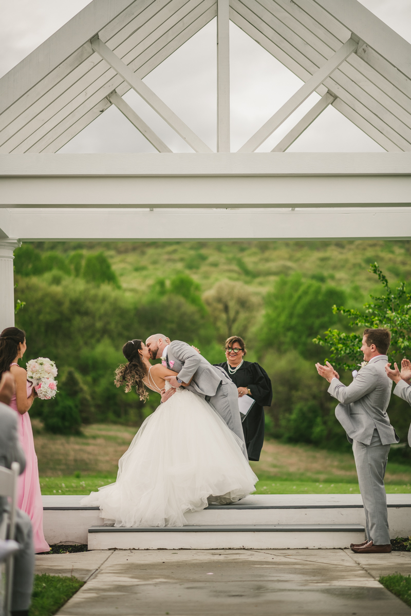 A beautiful stormy April wedding ceremony at Springfield Manor in Thurmont Maryland