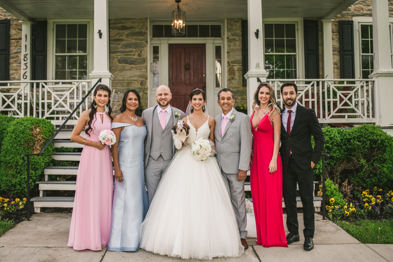 A beautiful stormy April wedding at Springfield Manor in Thurmont Maryland family formals in front of manor