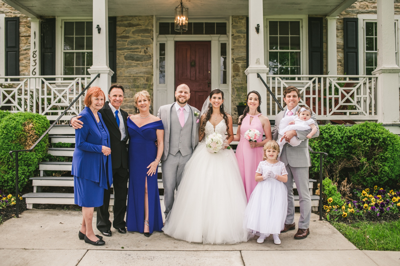 A beautiful stormy April wedding at Springfield Manor in Thurmont Maryland family formals in front of manor
