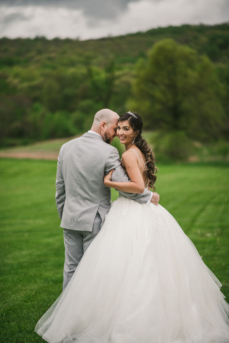 A beautiful stormy April wedding at Springfield Manor in Thurmont Maryland bride and groom portraits