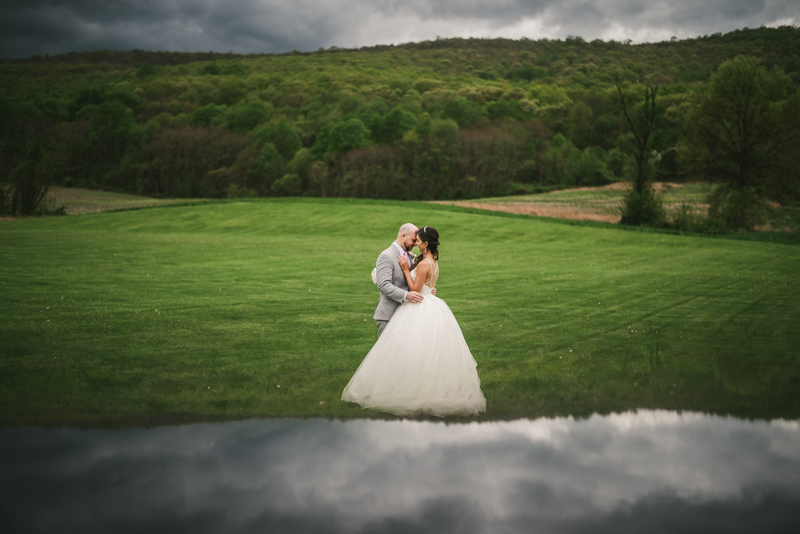 A beautiful stormy April wedding at Springfield Manor in Thurmont Maryland bride and groom portraits