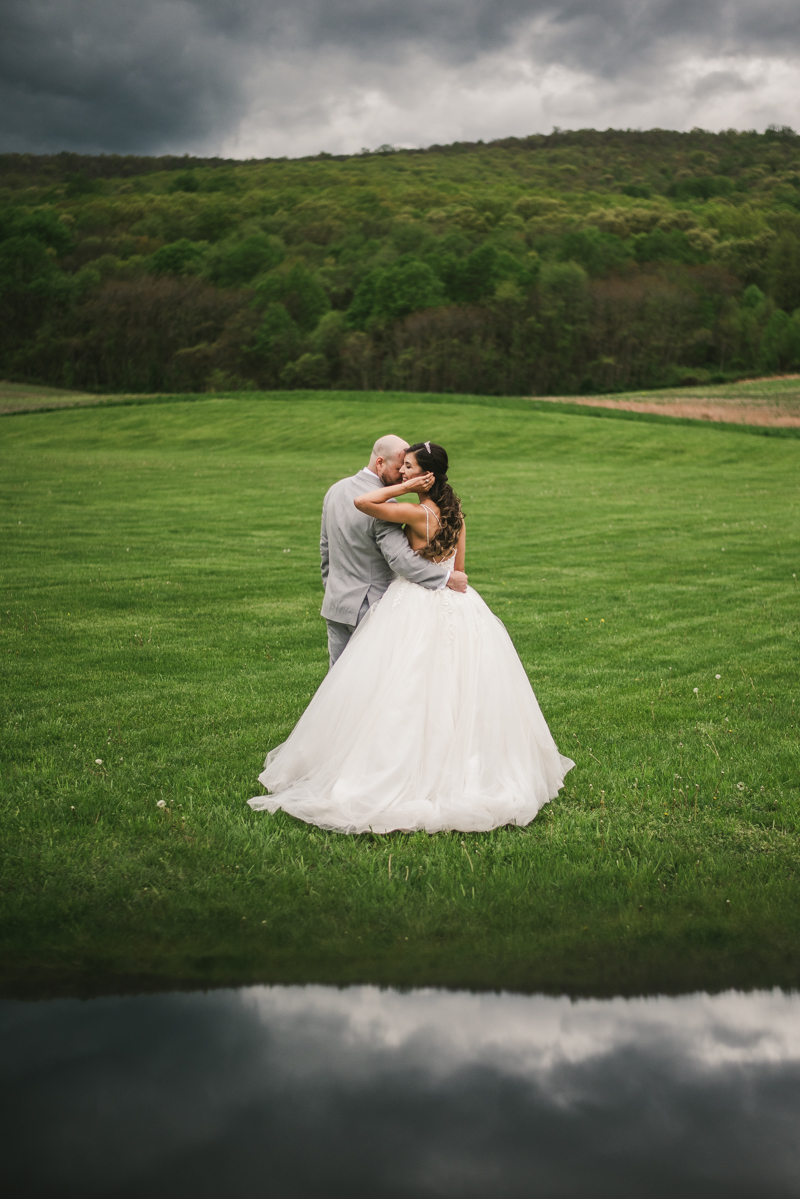 A beautiful stormy April wedding at Springfield Manor in Thurmont Maryland bride and groom portraits