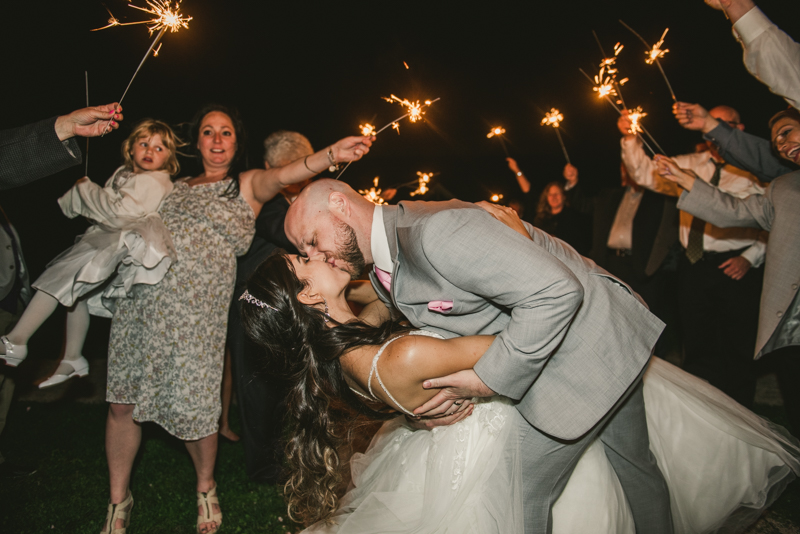 A beautiful stormy April wedding reception at Springfield Manor in Thurmont Maryland  with a sparkler sendoff to end the night