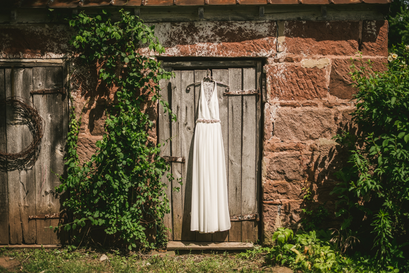 A gorgeous summer wedding dress at Rocklands Farm Winery in Poolesville, Maryland by Britney Clause Photography a husband and wife wedding photographer team in Maryland