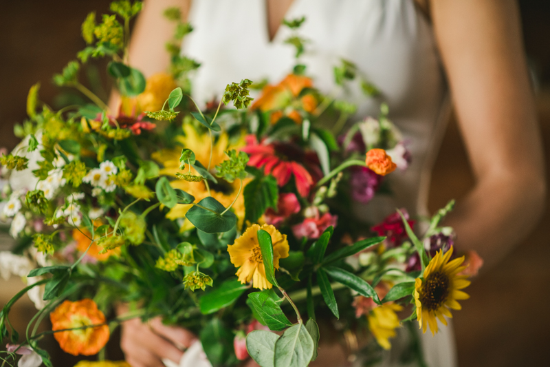 Gorgeous summer wedding florals by Sungold Flower Co at Rocklands Farm Winery in Poolesville, Maryland by Britney Clause Photography a husband and wife wedding photographer team in Maryland