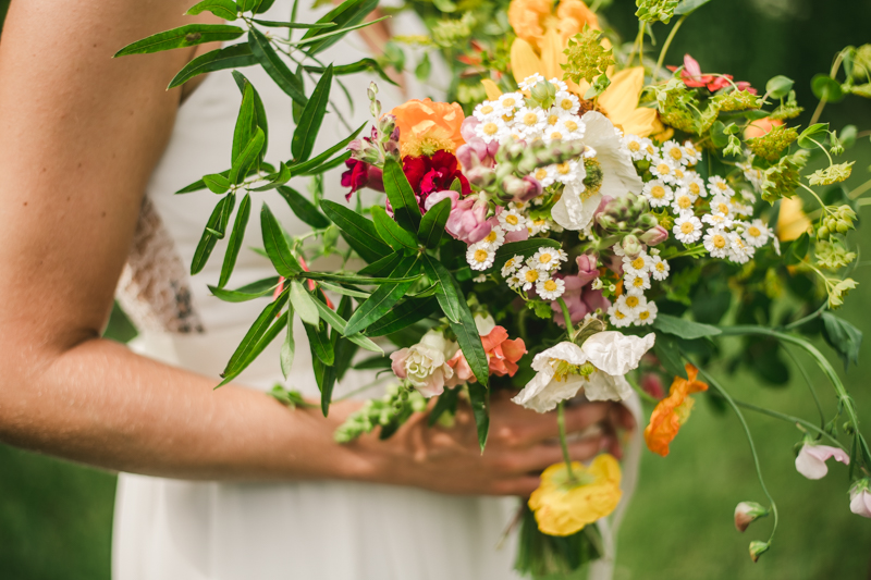 Gorgeous summer wedding florals by Sungold Flower Co at Rocklands Farm Winery in Poolesville, Maryland by Britney Clause Photography a husband and wife wedding photographer team in Maryland