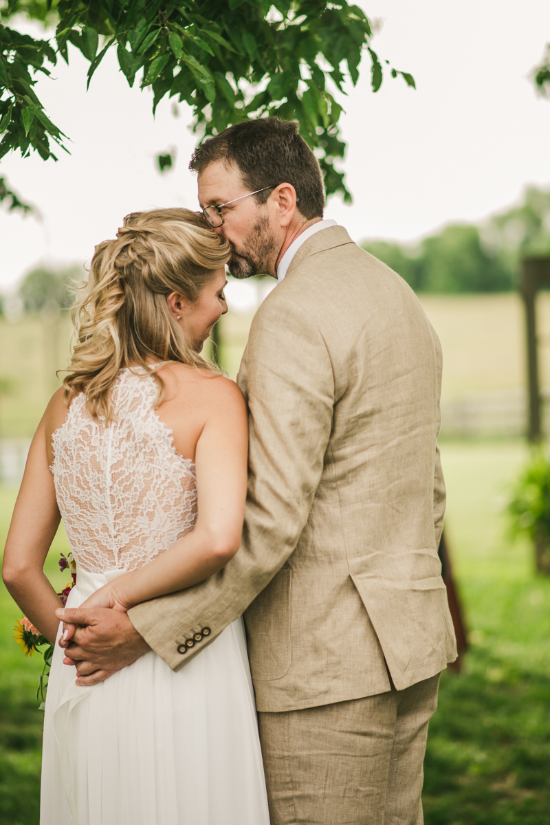 A gorgeous summer wedding at Rocklands Farm Winery in Poolesville, Maryland by Britney Clause Photography a husband and wife wedding photographer team in Maryland