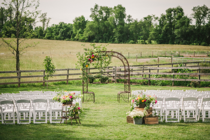 A gorgeous summer wedding ceremony at Rocklands Farm Winery in Poolesville, Maryland by Britney Clause Photography a husband and wife wedding photographer team in Maryland