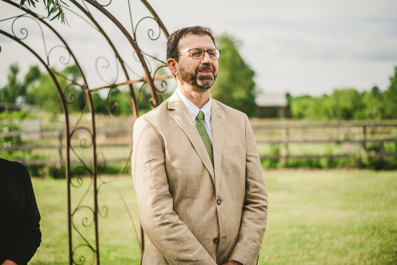 A gorgeous summer wedding ceremony at Rocklands Farm Winery in Poolesville, Maryland by Britney Clause Photography a husband and wife wedding photographer team in Maryland