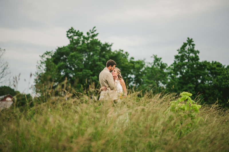 Gorgeous summer wedding bride and groom portraits at Rocklands Farm Winery in Poolesville, Maryland by Britney Clause Photography a husband and wife wedding photographer team in Maryland