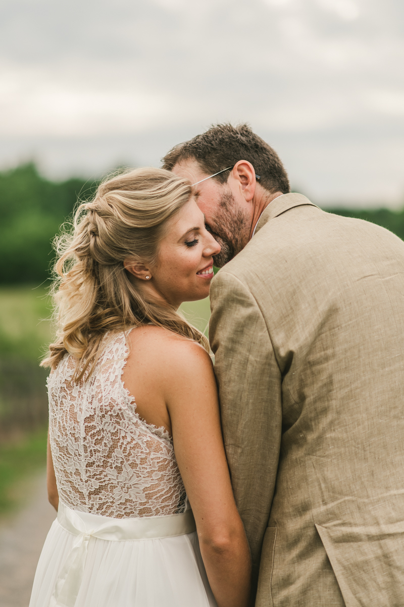 Gorgeous summer wedding bride and groom portraits at Rocklands Farm Winery in Poolesville, Maryland by Britney Clause Photography a husband and wife wedding photographer team in Maryland