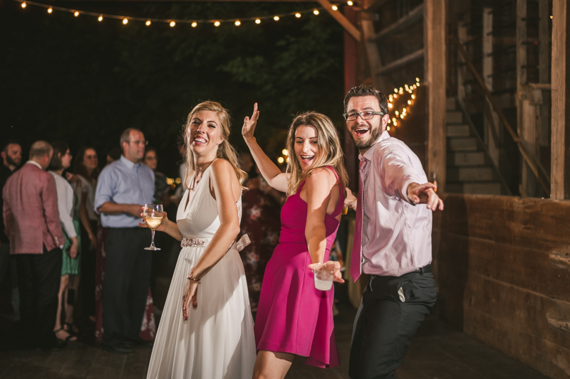 A gorgeous summer wedding at Rocklands Farm Winery in Poolesville, Maryland by Britney Clause Photography a husband and wife wedding photographer team in Maryland
