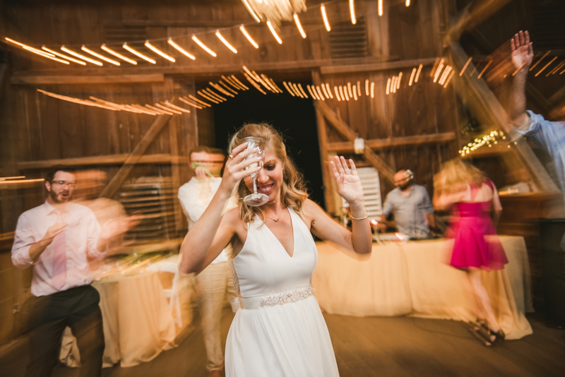 A gorgeous summer wedding at Rocklands Farm Winery in Poolesville, Maryland by Britney Clause Photography a husband and wife wedding photographer team in Maryland