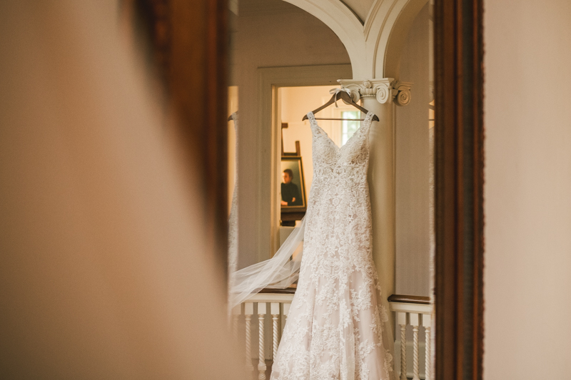 A gorgeous wedding dress from Cameo Bridal Salon at Liriodendron Mansion in Bel Air, Maryland by Britney Clause Photography