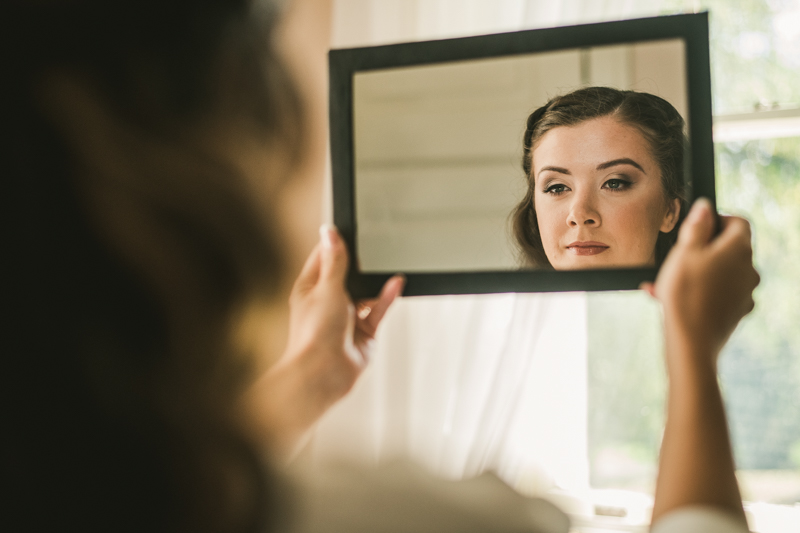 Gorgeous bridal hair and makeup by Pins-n-Brushes at a wedding at Liriodendron Mansion in Bel Air, Maryland by Britney Clause Photography