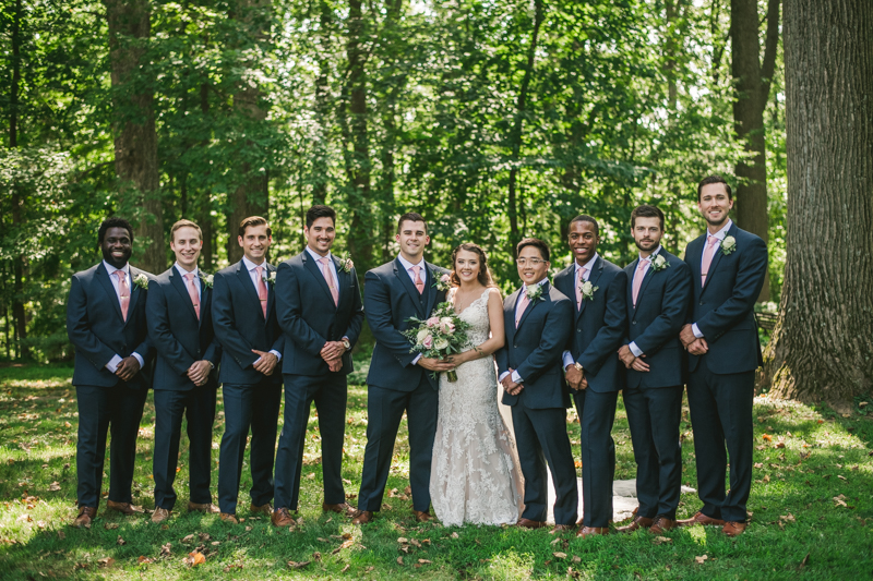 Posing a gorgeous large bridal party at Liriodendron Mansion in Bel Air, Maryland by Britney Clause Photography