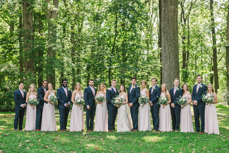 Posing a gorgeous large bridal party at Liriodendron Mansion in Bel Air, Maryland by Britney Clause Photography