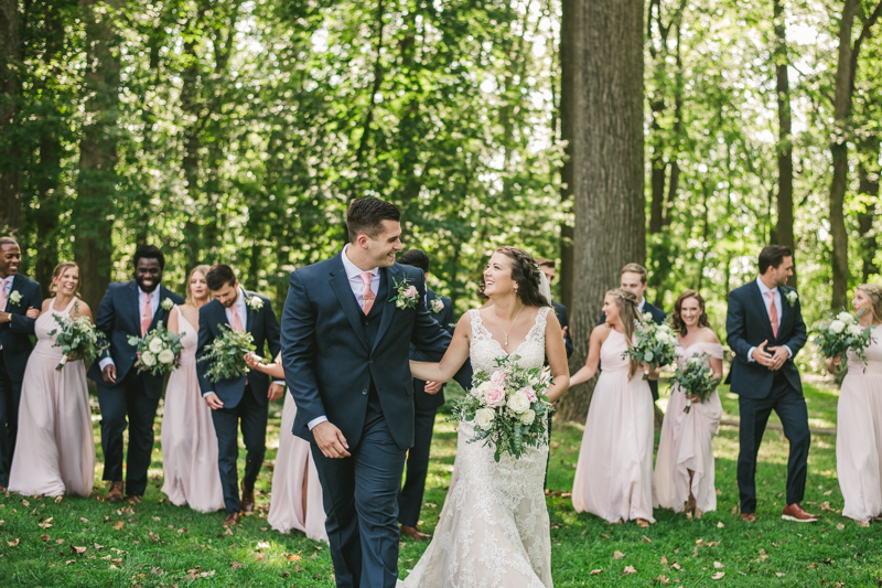 Posing a gorgeous large bridal party at Liriodendron Mansion in Bel Air, Maryland by Britney Clause Photography