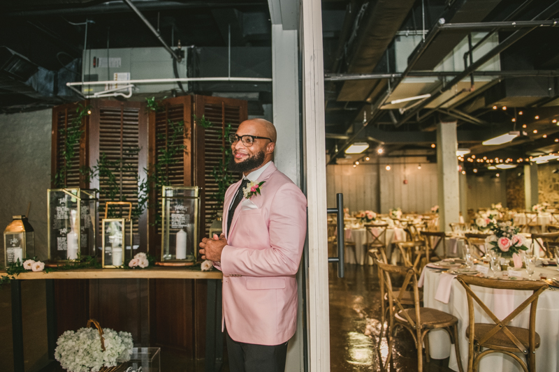 Beautiful first touch moment at Main Street Ballroom in Ellicott City by Britney Clause Photography