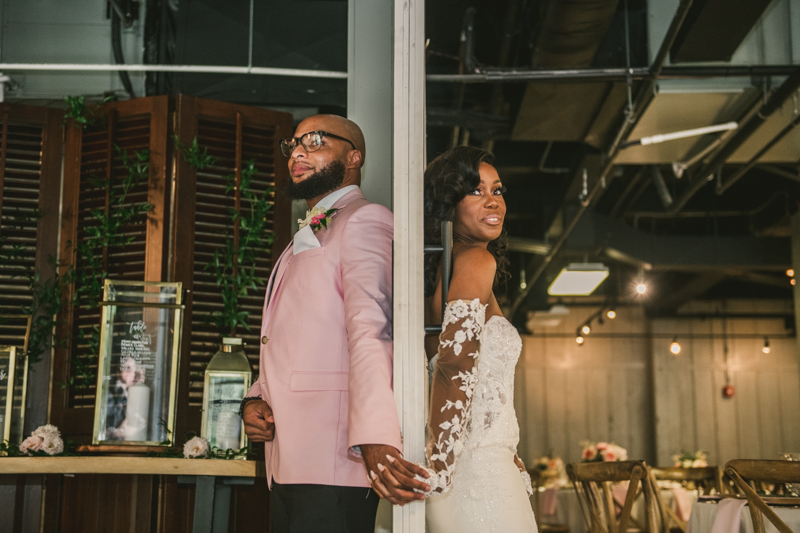 Beautiful first touch moment at Main Street Ballroom in Ellicott City by Britney Clause Photography