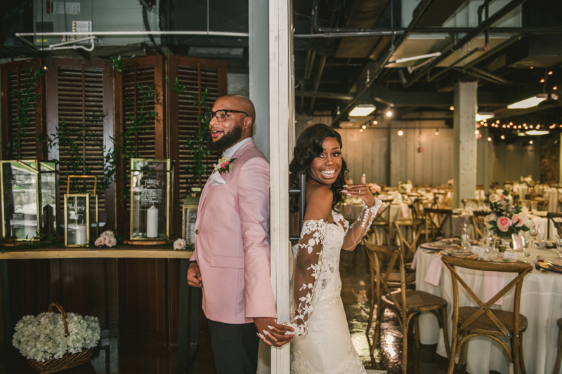 Beautiful first touch moment at Main Street Ballroom in Ellicott City by Britney Clause Photography