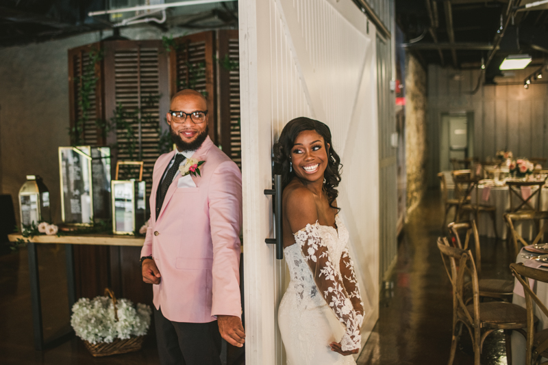 Beautiful first touch moment at Main Street Ballroom in Ellicott City by Britney Clause Photography