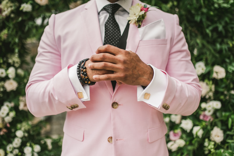 Handsome groom getting ready at Main Street Ballroom in Ellicott City by Britney Clause Photography