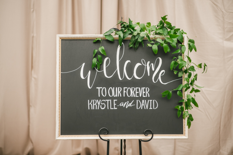 Beautiful DIY ceremony welcome sign at Main Street Ballroom in Ellicott City by Britney Clause Photography